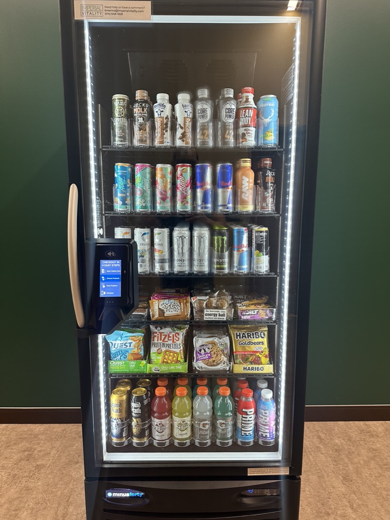 An Imperial Vitality cooler at the USAJFKSWCS Holistic Health & Fitness facility on Fort Bragg &mdash; protein drinks, energy drinks, and a scan-to-pay touchscreen