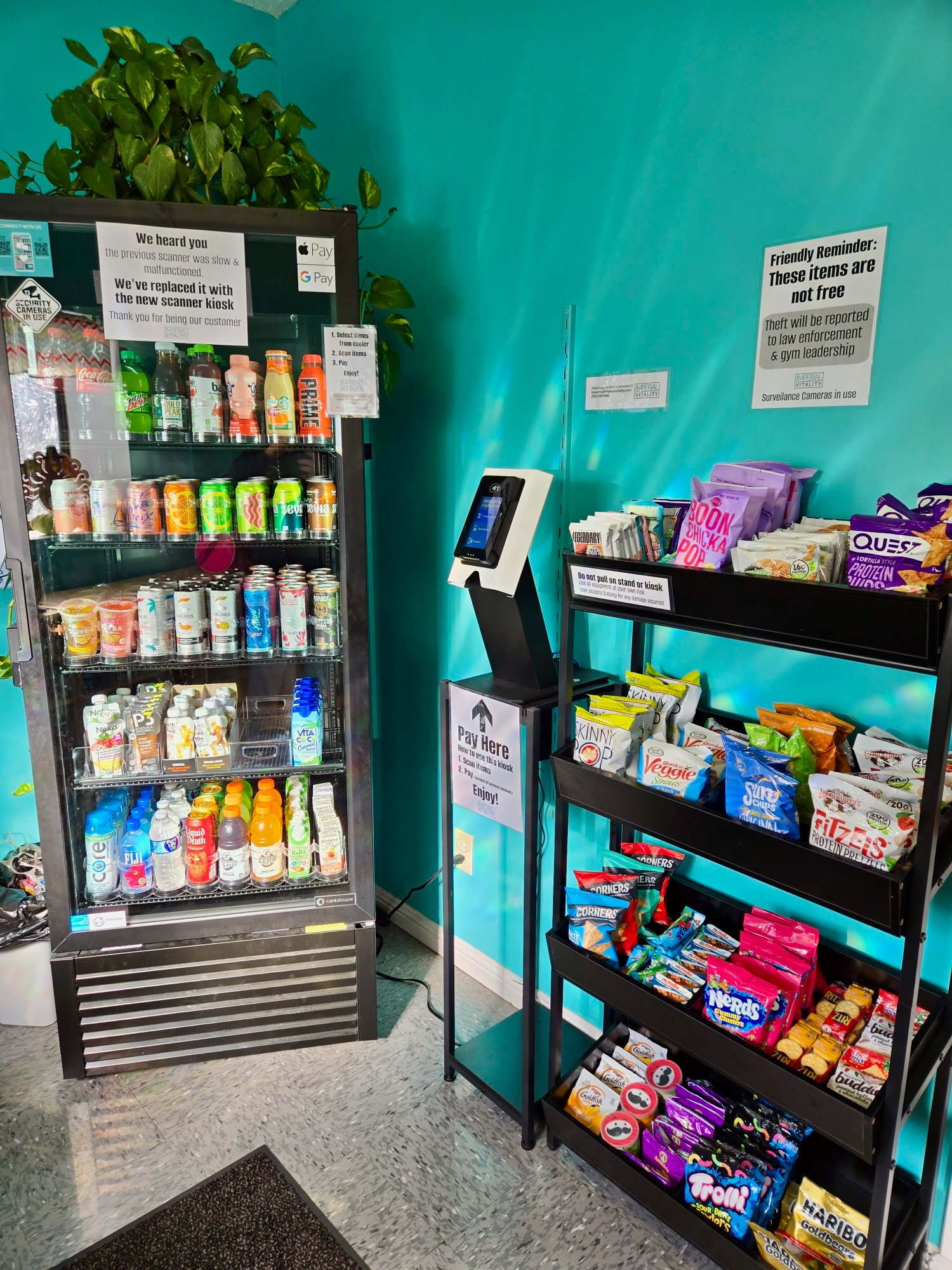 An Imperial Vitality micro market at Sandhills Gymnastics in Aberdeen &mdash; a drink cooler beside a scan-to-pay kiosk and shelves of protein snacks